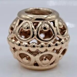 Pandora, 14 karat gilded cage charm